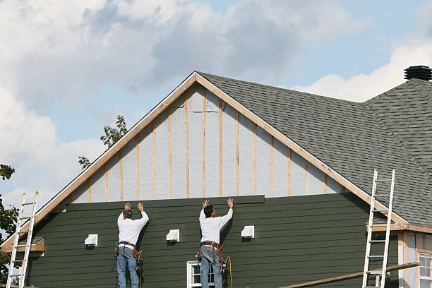 Professional Siding Installation technician working in Wingate, NC